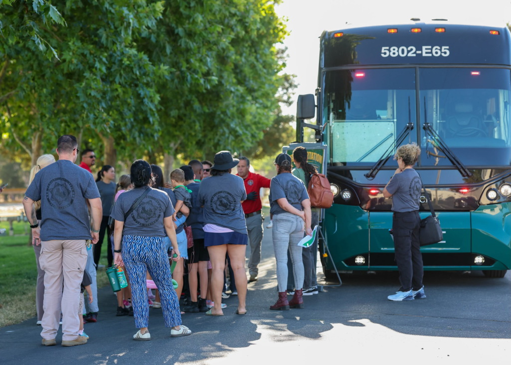 Staff family members learn about the CDCR transportation unit.