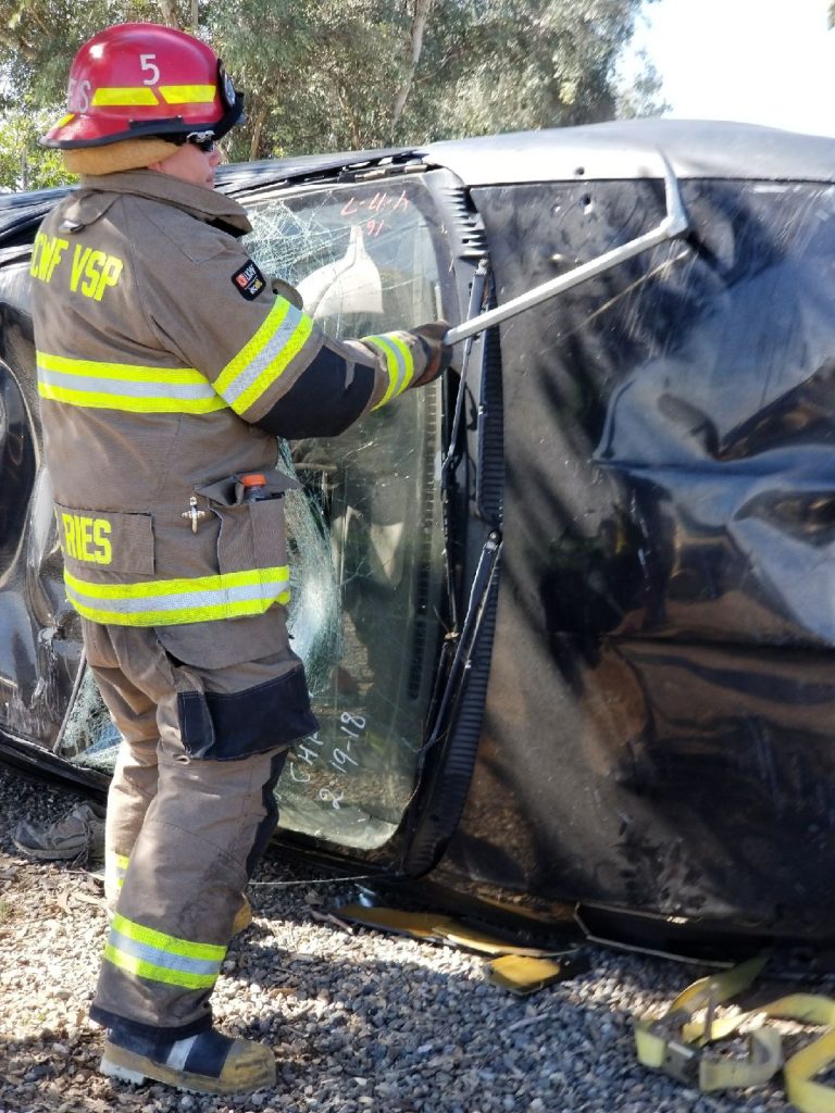 Extricating from a crushed vehicle, CCWF Fire Captain Ries.