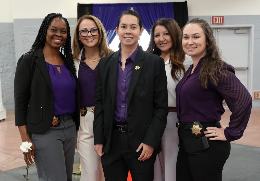 Warden A. Delacruz with other CDCR staff at the symposium.