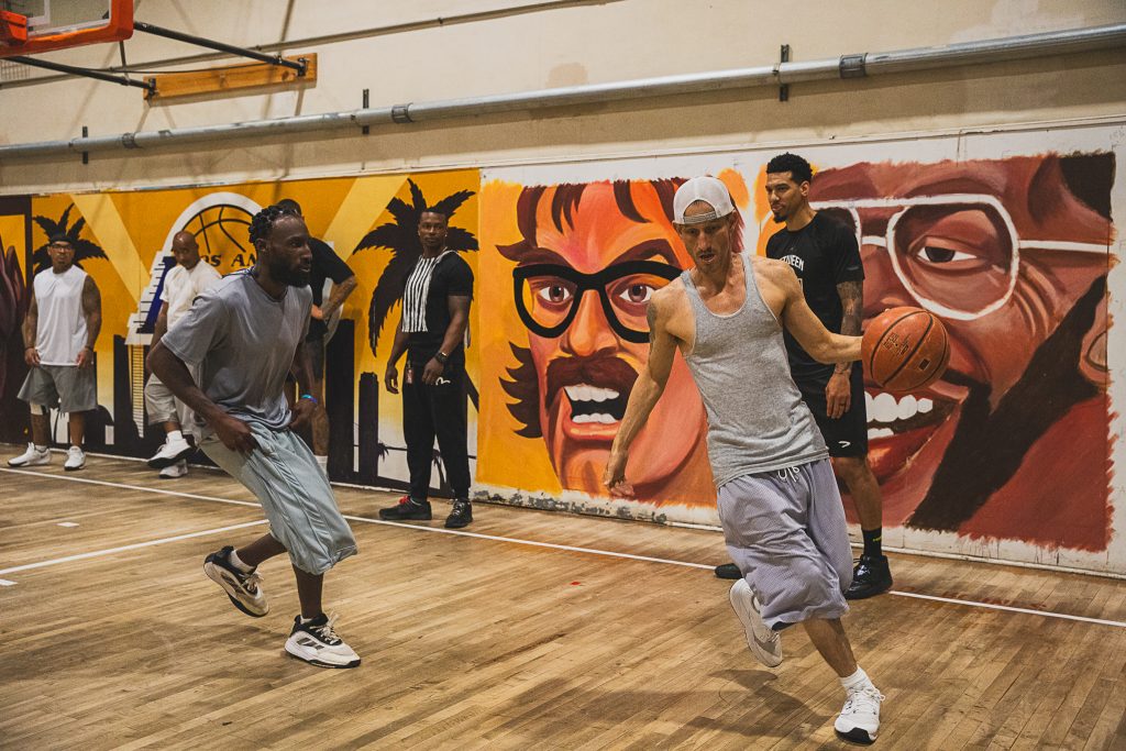 Two players square off on the school side of the road.