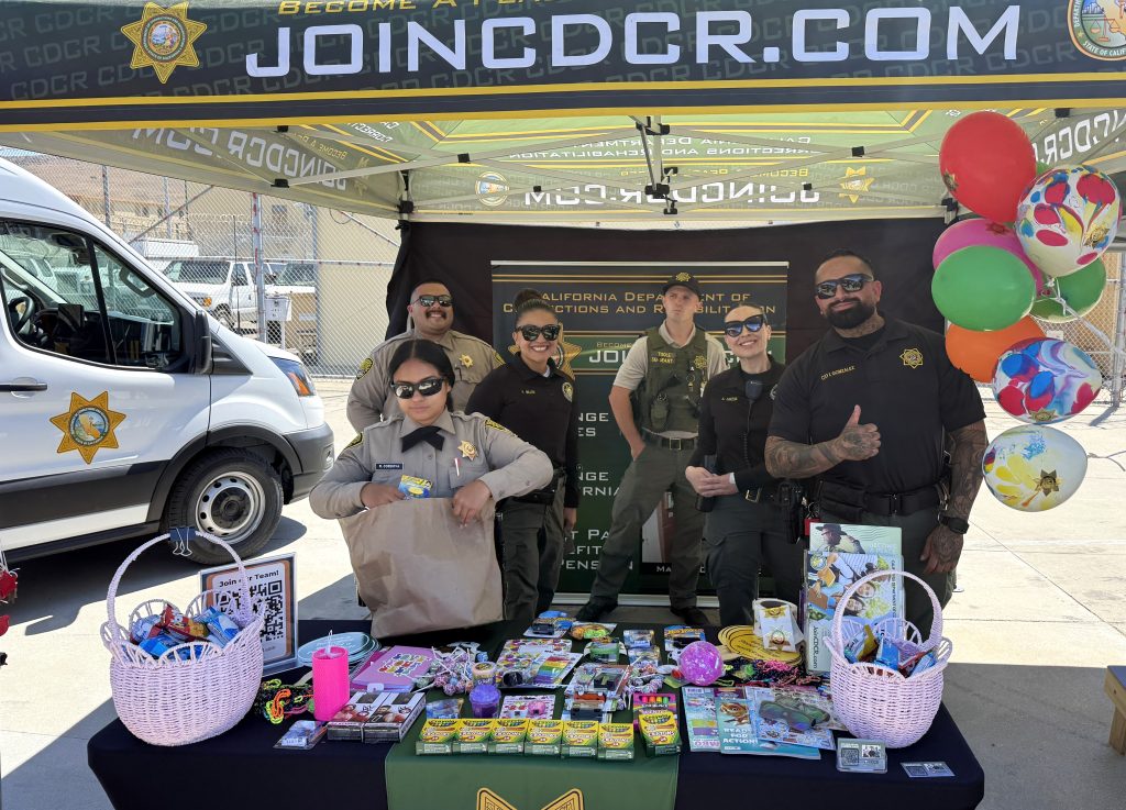 Staff at a booth at CMC.