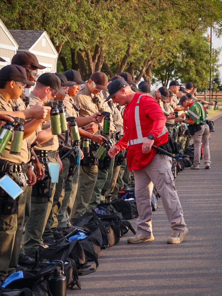 Cadets are inspected during alarm response training at the CDCR Academy.