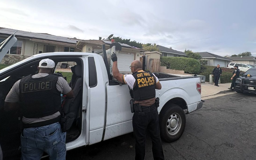 A CDCR parole agent works with the Chula Vista Police Department during a compliance sweep dubbed Operation Ground Truth.
