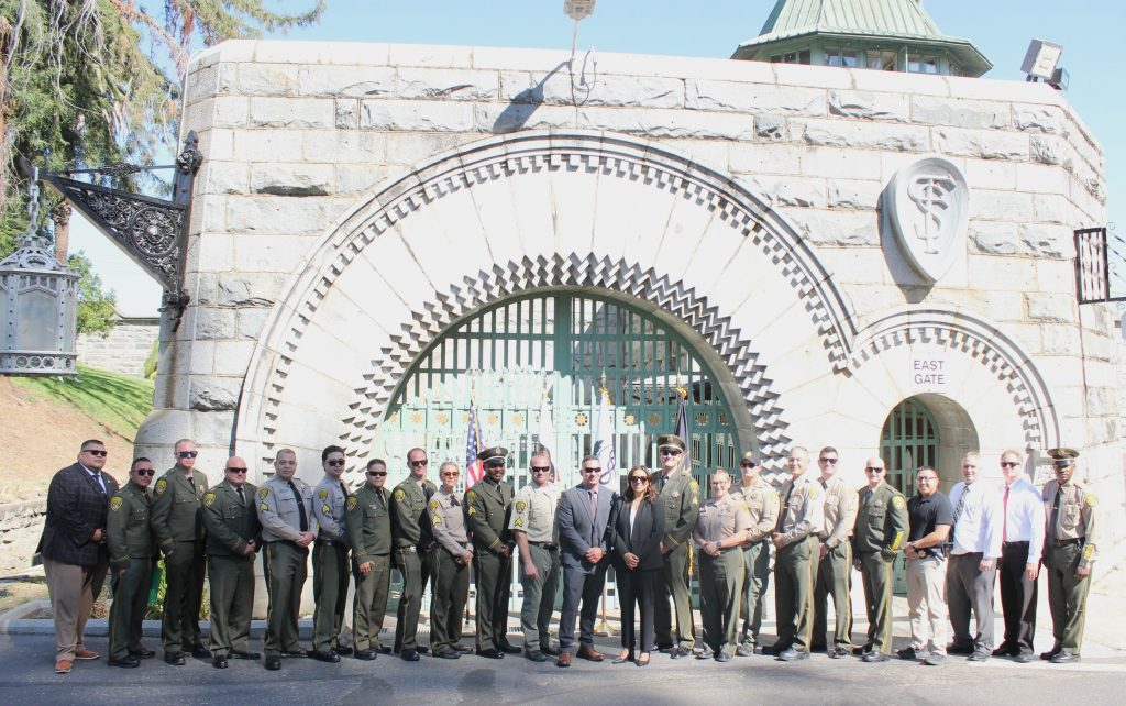Some of the staff members with the warden in front of Folsom State Prison's East Gate, July 31, 2026, Represa, California.