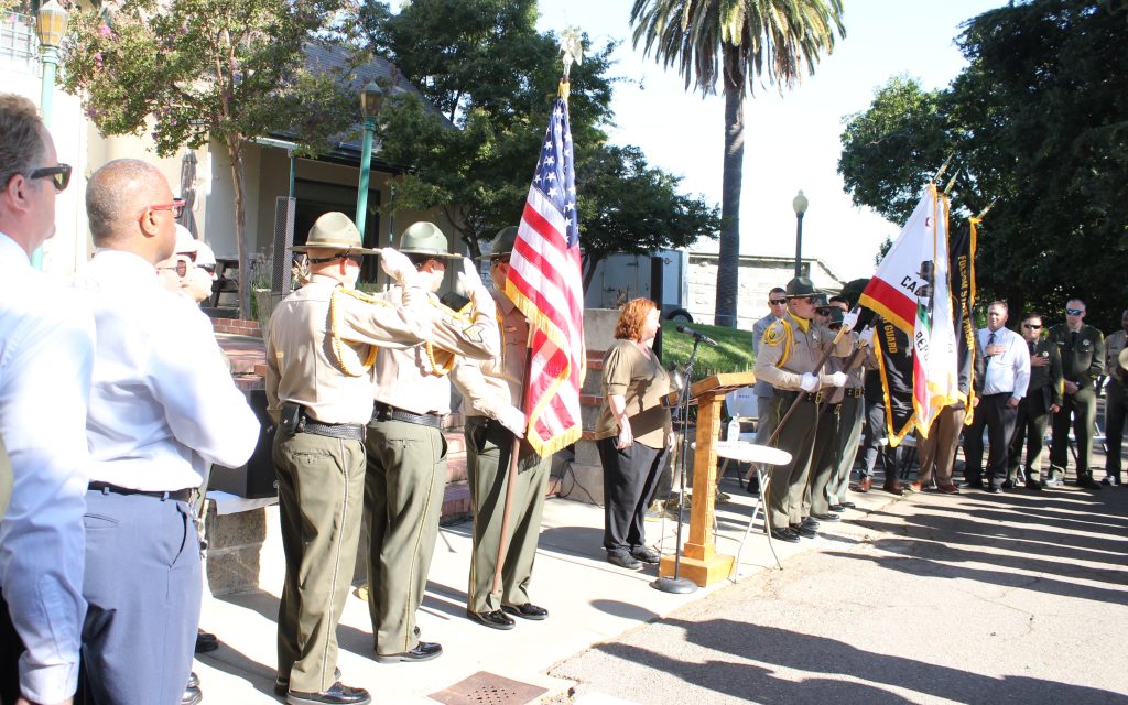 Opening ceremony for the first Folsom State Prison promotional event with family and friends honoring 34 staff members.