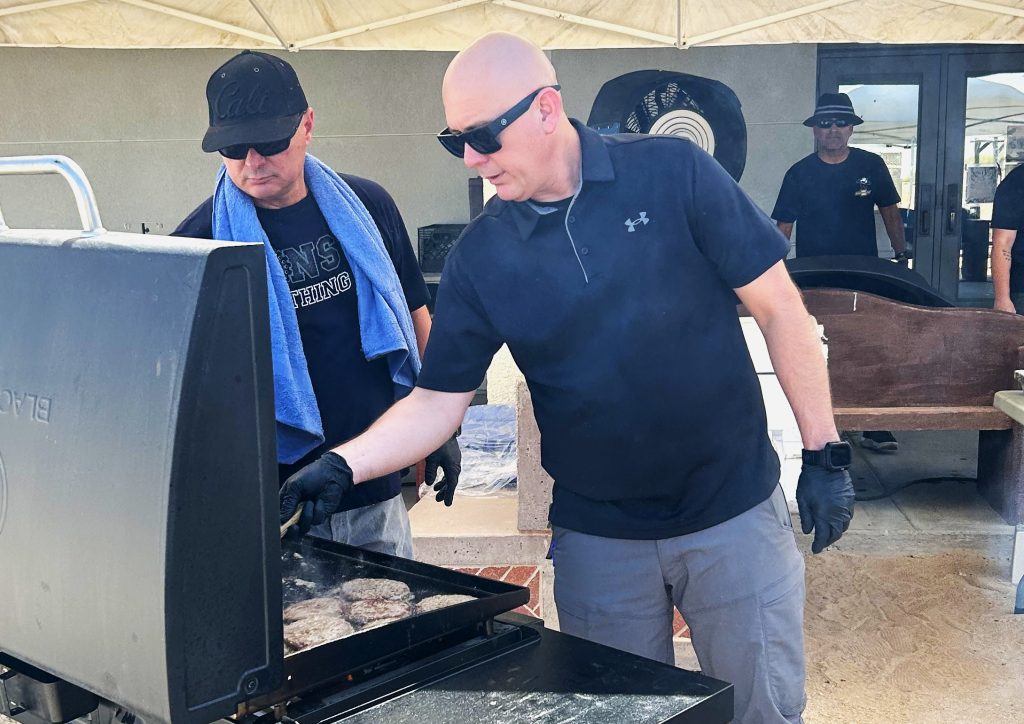 Managers man the grill at Ironwood State Prison.