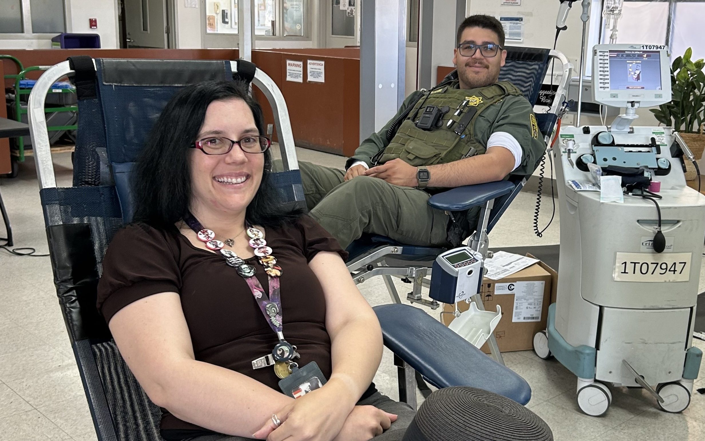 Two RJD staff members donating.