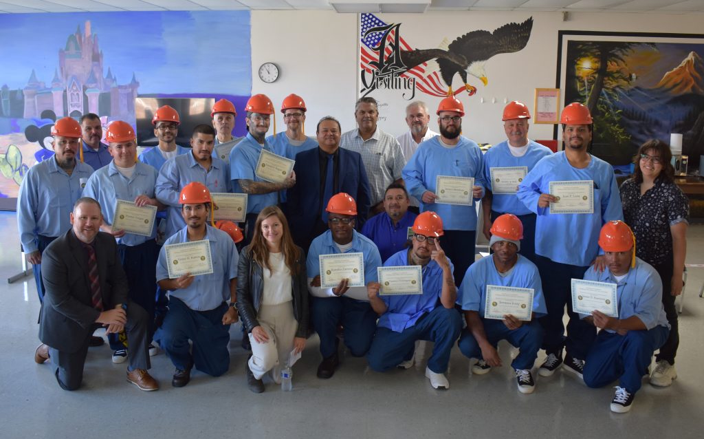 Group photo of graduates and staff at SVSP.