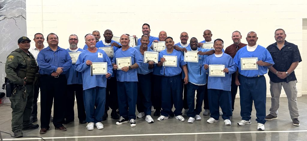 Group photo of Correctional Construction Mentorship graduates and instructors at Valley State Prison in Chowchilla.