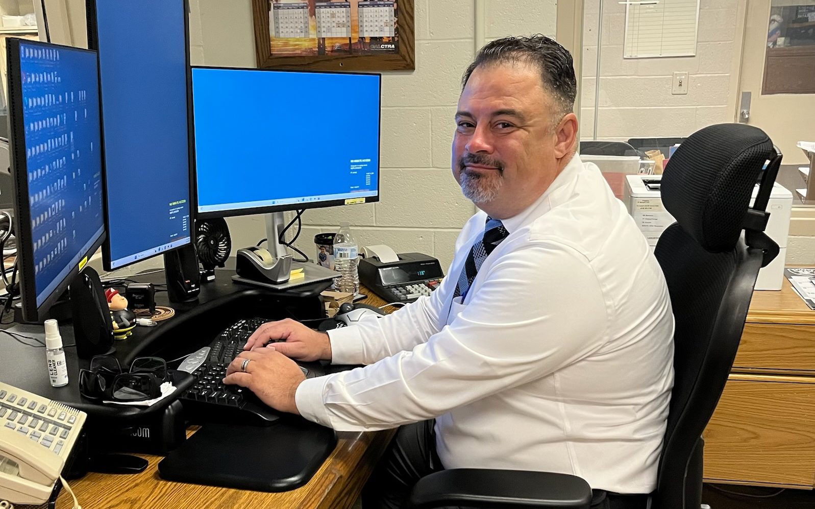 Correctional Food Manager II Rodriguez at his desk at Waso State Prison-Reception Center.