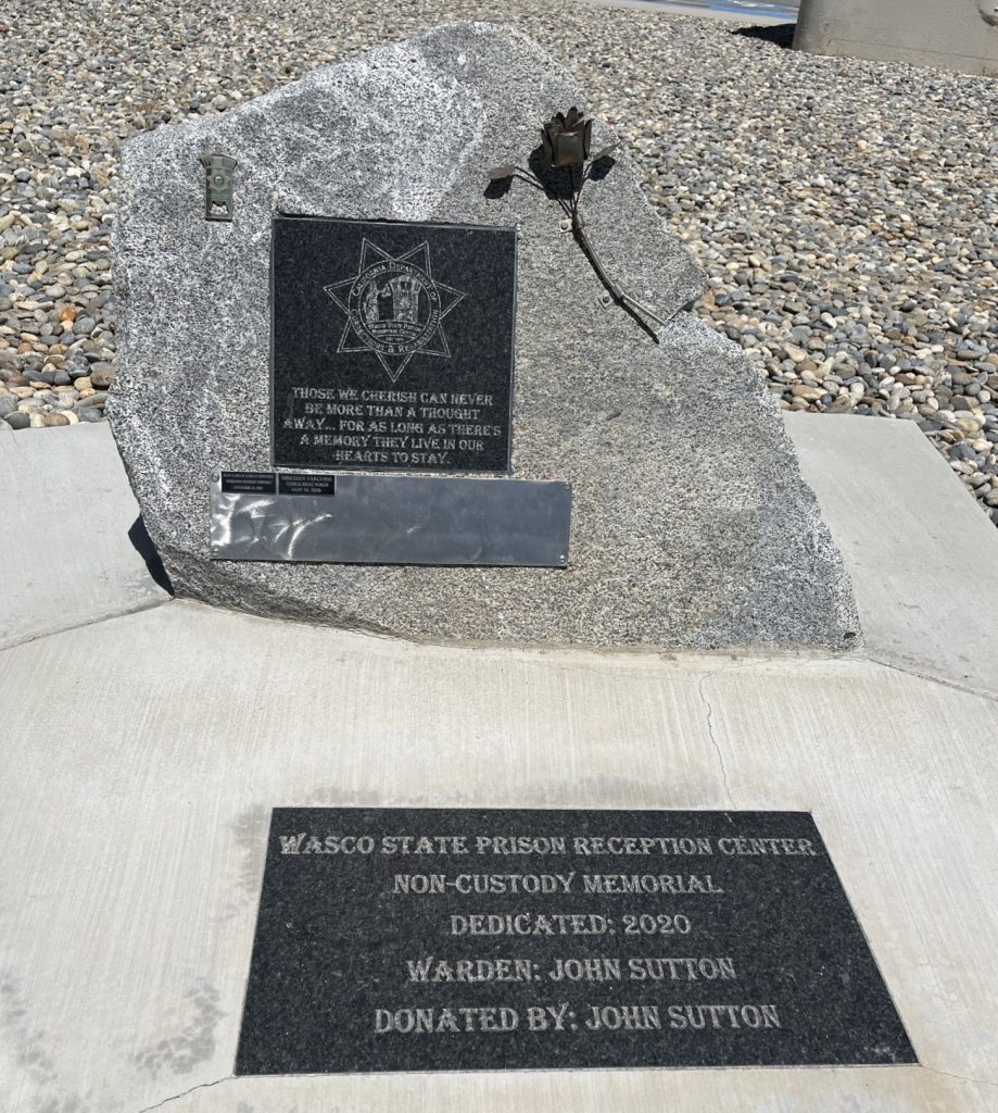 A plaque and stone dedicated to non-sworn staff who passed away sits at WSP-RC.