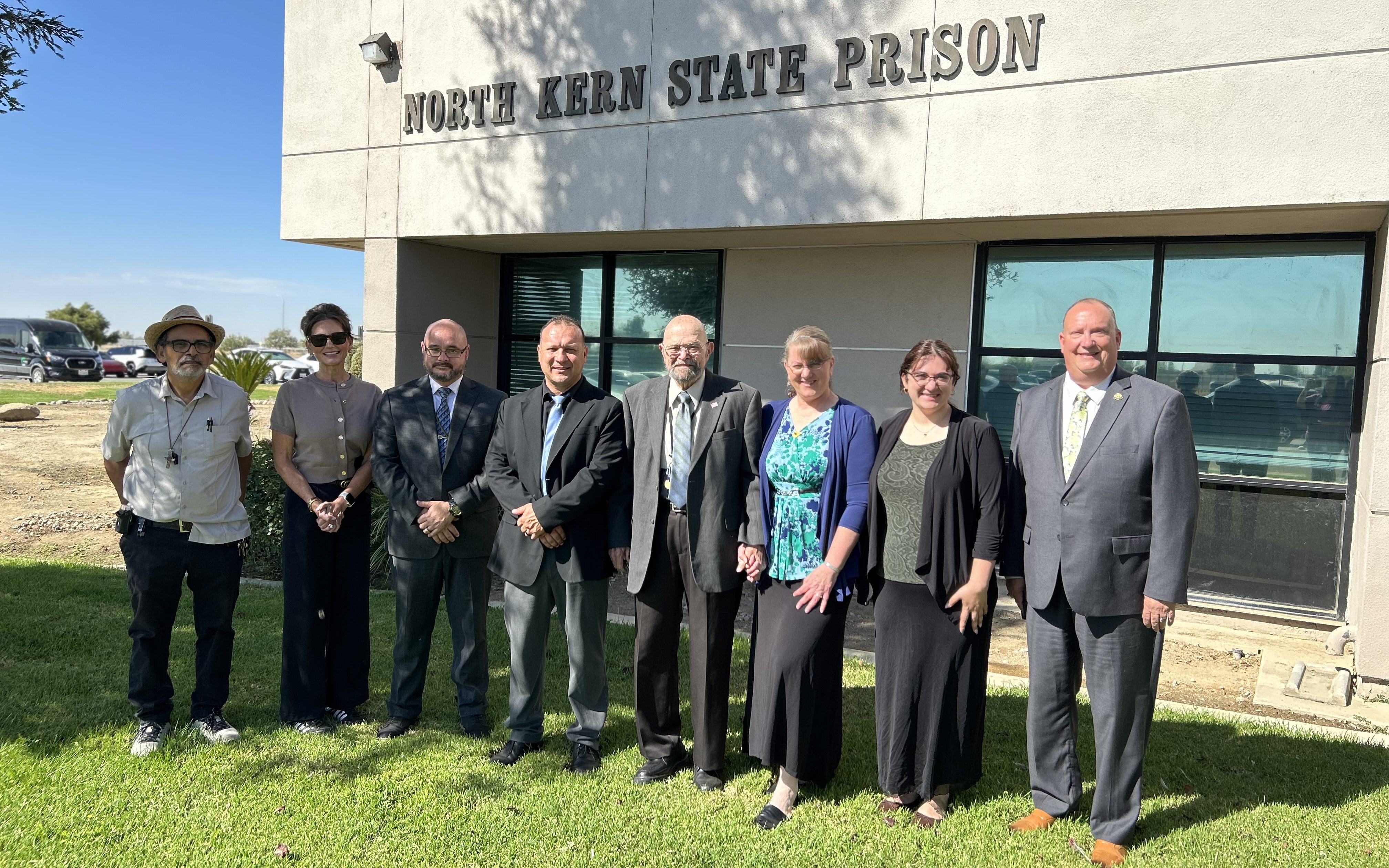 Gregory Arrout with North Kern State Prison leadership as they recognize his 25 years of dedicated volunteerism.