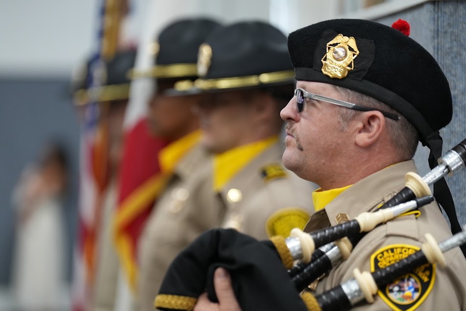 Honor guard and bagpipe player at the BCOA graduation.