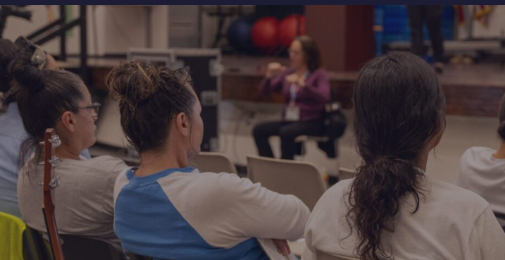 Incarcerated women in group seating