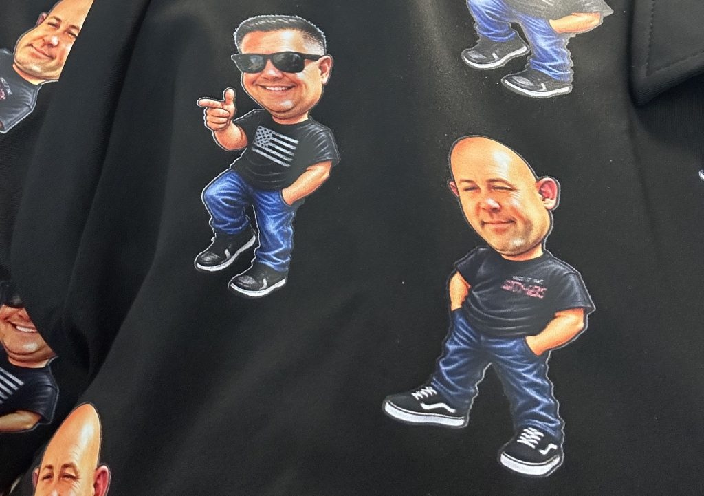 Images on a shirt show the warden and chief deputy warden at LAC in Lancaster, September 2026.