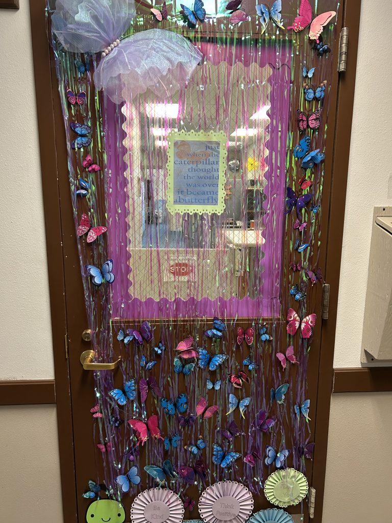 Colorfully decorated door at LAC for Suicide Awareness Month.