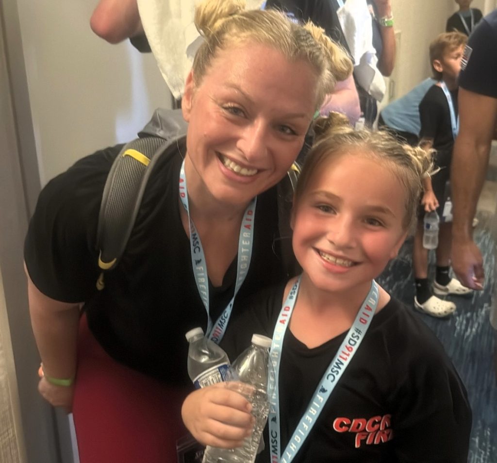 RJD staff member with her young daughter.