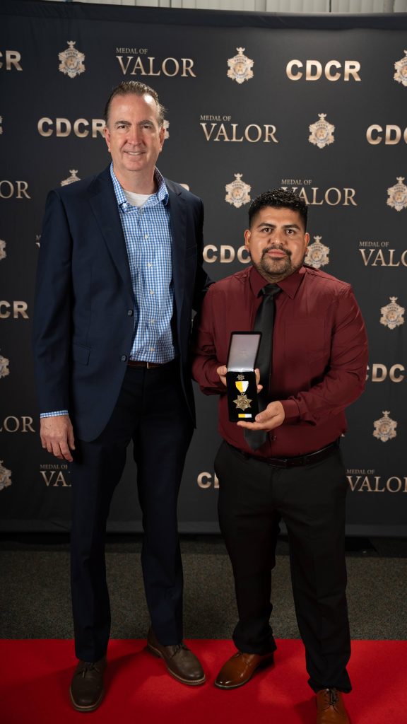 Secretary Macomber with honoree at the MOV 2026.