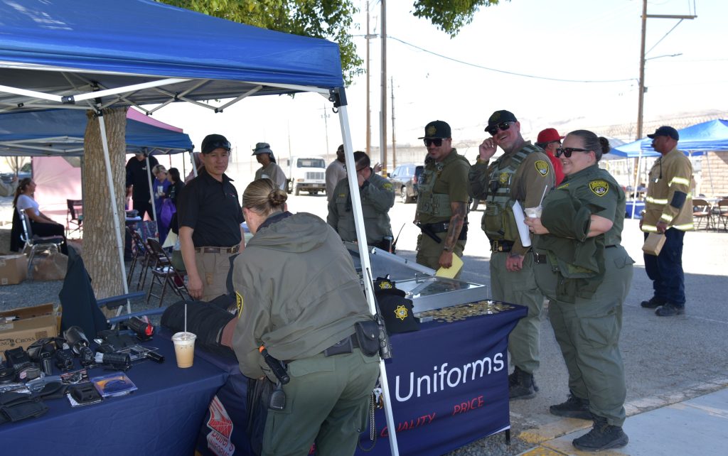 Employees check out a booth at Avenal State Prison.