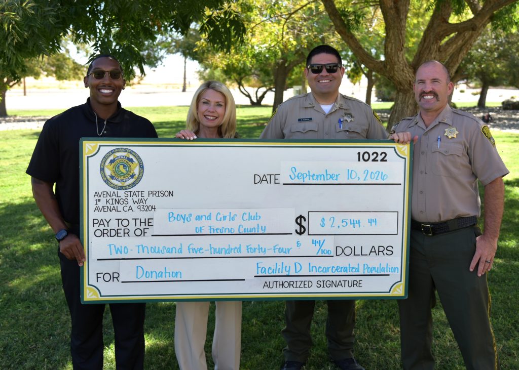 ASP delivers check for Boys and Girls Club of Fresno