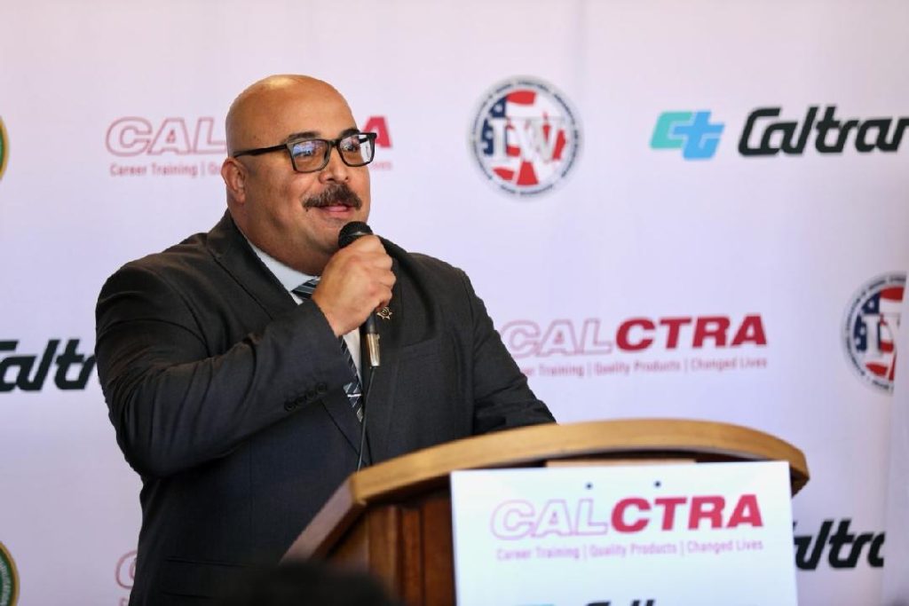 Eric Mejia, CIM's acting warden, speaks at the CALCTRA program ribbon cutting event.