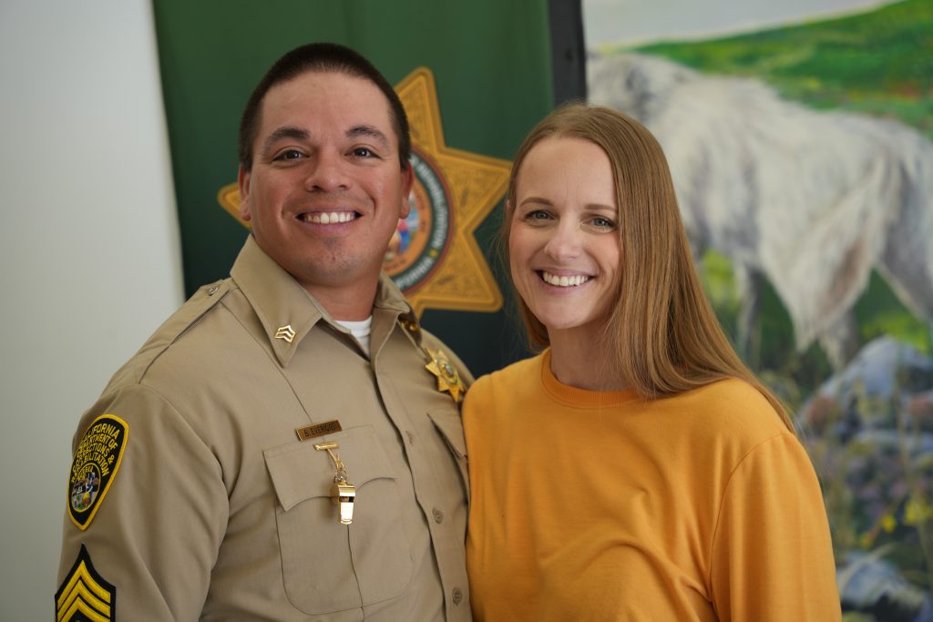 A new sergeant with his spouse at the CCI promotional ceremony.