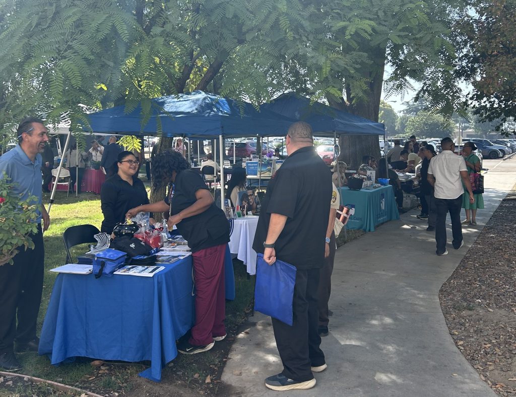 Information booth at CIM in Chino, California, Oct. 1, 2026.
