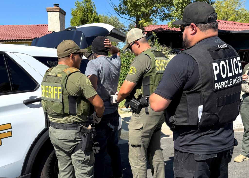 Division of Adult Parole Operations (DAPO) parole agents and partners from Riverside County Sheriff's Department make arrest during a compliance operation in Moreno Valley
