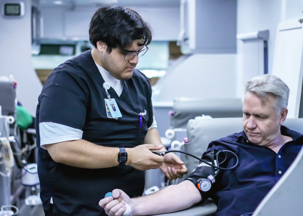 HQ staff participating in blood drive