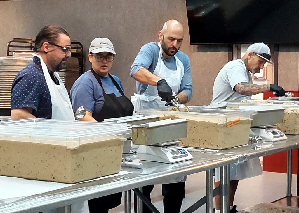Volunteers working the line at Hope the Mission