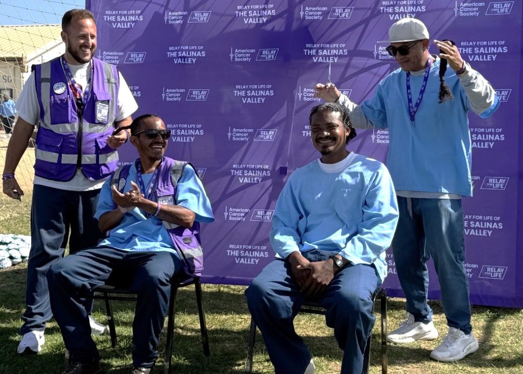 Incarcerated participants at CTF Relay for Life event donating their hair