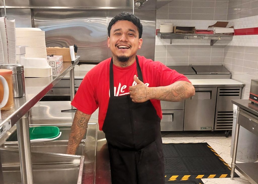 Tellez working in kitchen