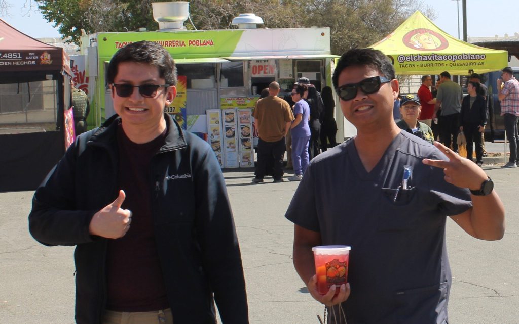 Two staff members give a thumbs-up during a health fair at Pleasant Valley State Prison (PVSP) in Coalinga, California, September 2026.
