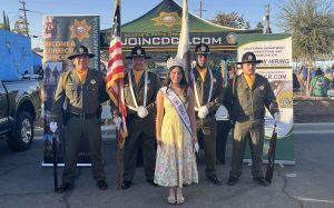 Wasco State Prison-Reception Center (WSP-RC) Honor Guard with the 2026 Rose Queen at National Night Out, Oct. 1, Wasco, California.