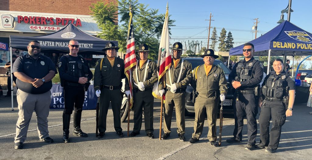Wasco State Prison-Reception Center (WSP-RC) Honor Guard with other law enforcement personnel at National Night Out, Oct. 1, Wasco, California.
