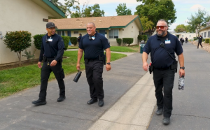 Parole Agent Kesteloot with other parole cadets walk at the academy before graduating with class 3-26P.