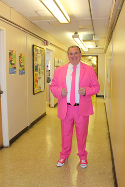 Ken Fewer in pink suit.