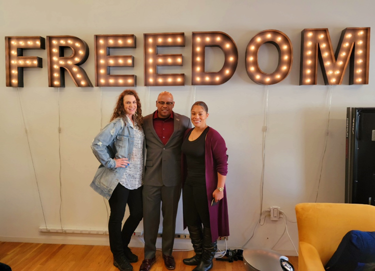 Parole Agent II and Re-Entry Coordinator Erika Mutchler (left), Anti Recidivism Coalition Executive Director Sam Lewis (center) and Parole Agent I Tracee Agee (right). 