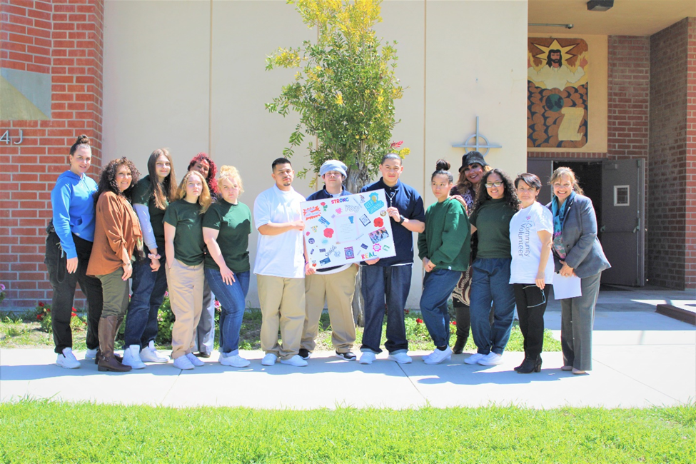 From L-R. Erika Mutchler, Parole Agent III, Simona Ponce De Leon, Community Resource Manager, youth Bailey M. Yanira Giron, Bank of America, youth Amarie J., youth Victora B., youth Hugo C., youth Christian H., youth Ian J., youth Ana T., Karette Fussell, Supervising Casework Specialist, youth Josohamy M., Lidia Alfaro, Bank of America, Rosalinda Vint, CEO, Women of Substance Men of Honor 
