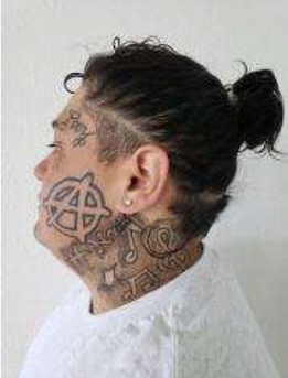 Side Profile showing tattoos 