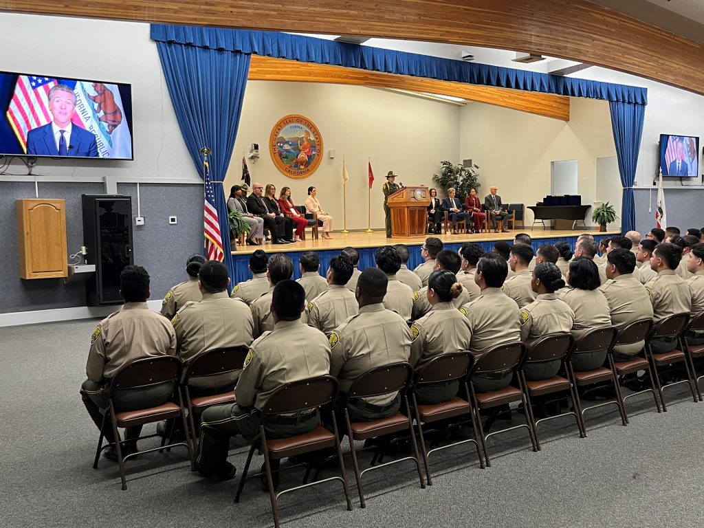 Cadets listen to Governor Newsom at the Basic Correctional Officer Academy in Galt.