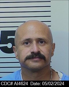 A mugshot of incarcerated person Armando Macias, who is deceased.