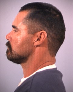 Side mugshot image of Raul Medas Perez