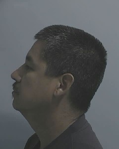 Side mugshot image of Teodoro  Gutierrez