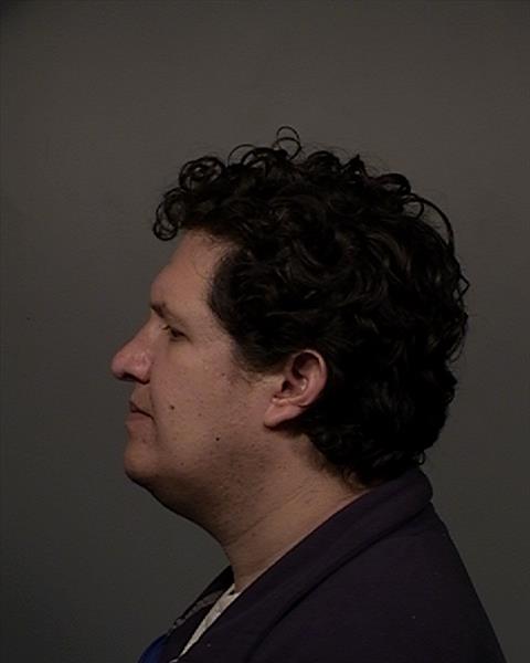 Side mugshot image of Rene  Gutierrez