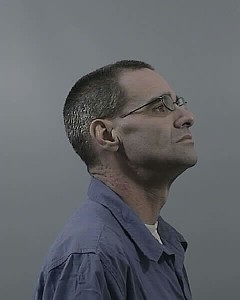 Side mugshot image of Robert  Curtis