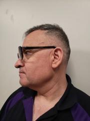 Side mugshot image of Emmanuel Leonardo Gomez