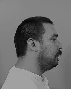 Side mugshot image of Jorge  Padilla