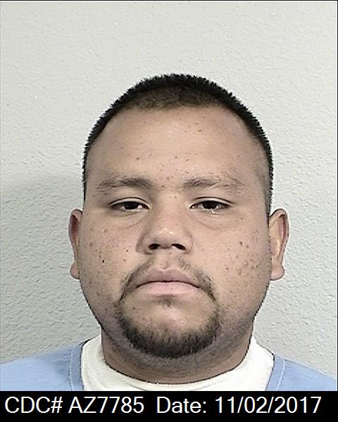 Front mugshot image of Christian Victoria Flores
