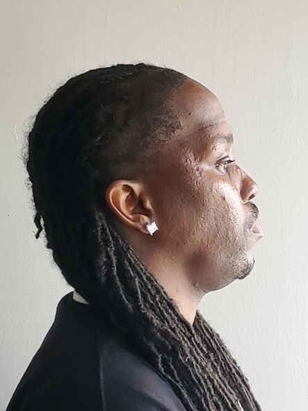 Side mugshot image of Deandrea  Hadnot